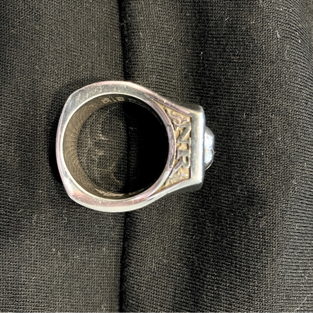 Night Rider .925 sterling silver ring with moissanite eyes. Size 8.